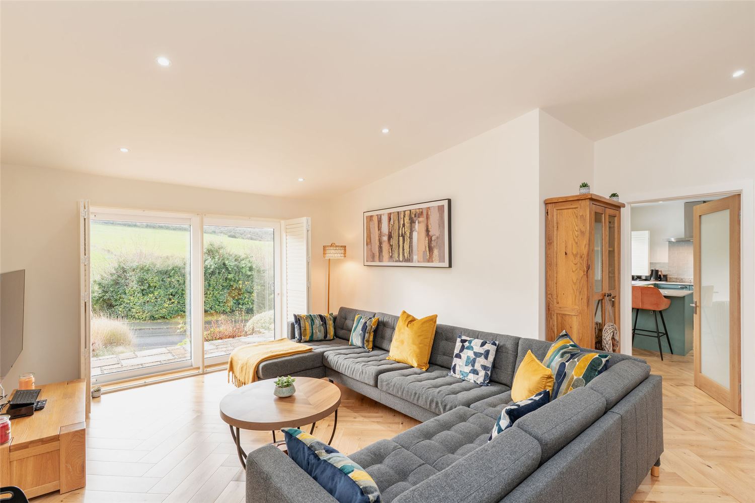 Wow what a view. Take a seat on our comfy L shaped sofa. 65 inch smart tv. Games galore and a wood burner