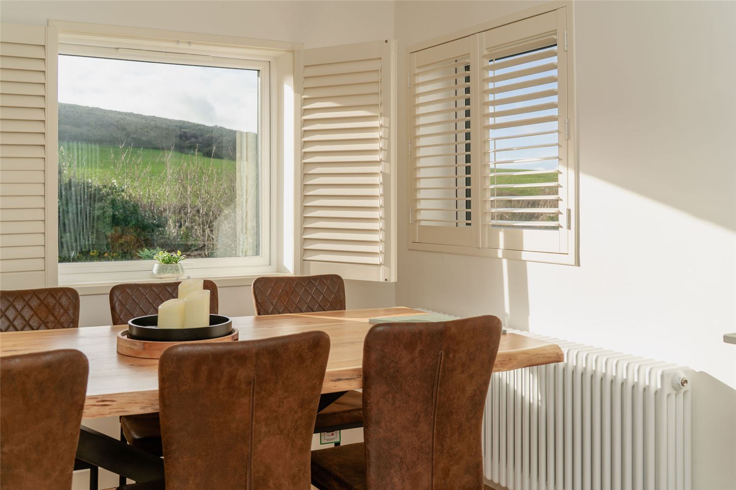 Family dining area with 6 seats and an incredible view of Bindon Hill