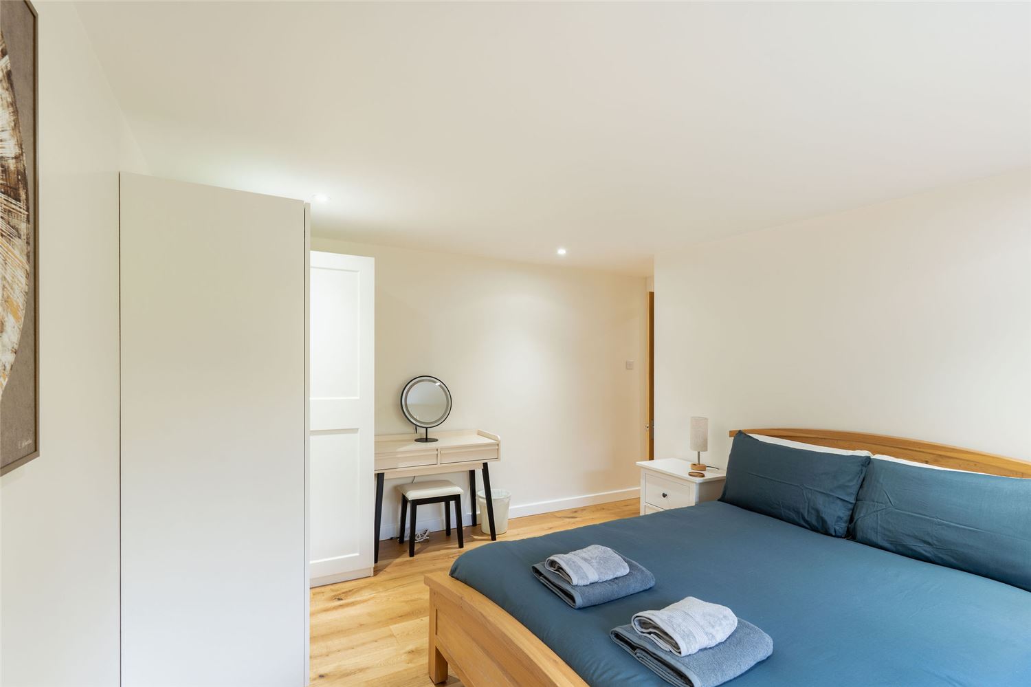 Our 3rd bedroom is a lovely king with sleek lines